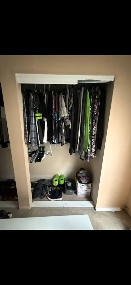 Closet shelving pulled out of the wall before repair