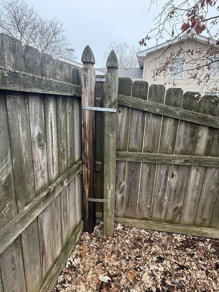 Wood fence during post repair
